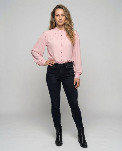 Women's lightly flowing blouse with balloon sleeves.