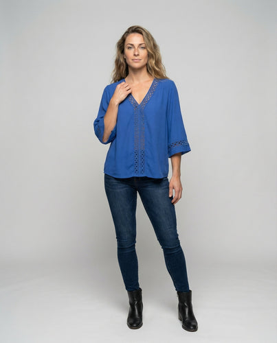 Women's light Boho summer blouse with crochet lace.