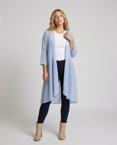 Women's lightweight chiffon kimono with ruffled hem.