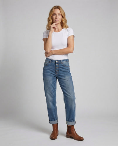 Ladies' jeans jumpsuit with tailored cutouts and wide leg.