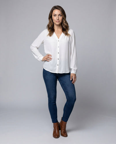 Women’s Carmen top with puff sleeves and large back bow.