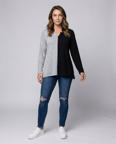 Ladies knot detail blouse with V-neck and three-quarter batwing sleeves.