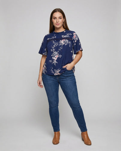Women's loose tunic blouse with lace yoke