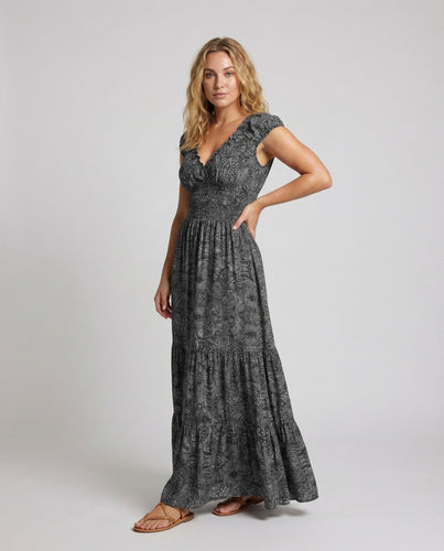 Women's maxi dress with smocked bodice and flared skirt