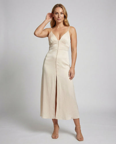 Women's silky flowing slip dress with decorative button placket