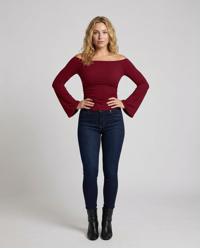 Women's fitted crop top with trumpet sleeves