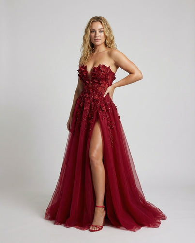 Ladies luxurious evening dress with flower appliqués