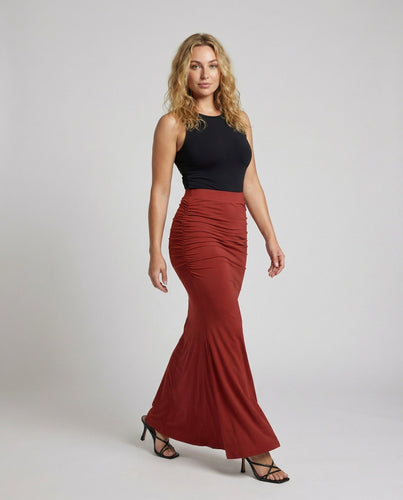 Ladies tailored maxi skirt with side gathering