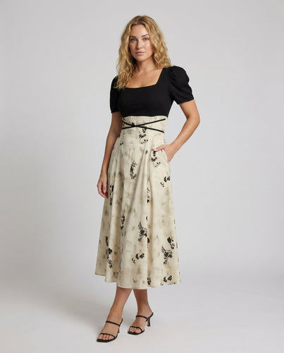 Women's midi dress with puff sleeves and floral skirt