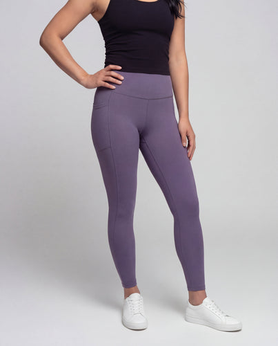 Women's high-waisted yoga leggings with cross detail