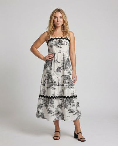 Women's maxi dress with rustic motif and decorative trim
