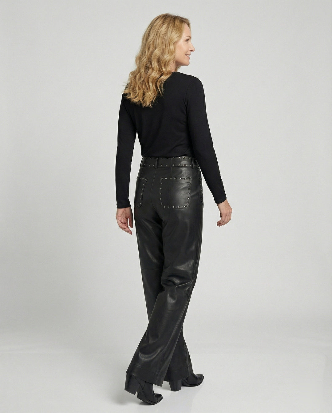 Ladies trendy faux leather pants with studs