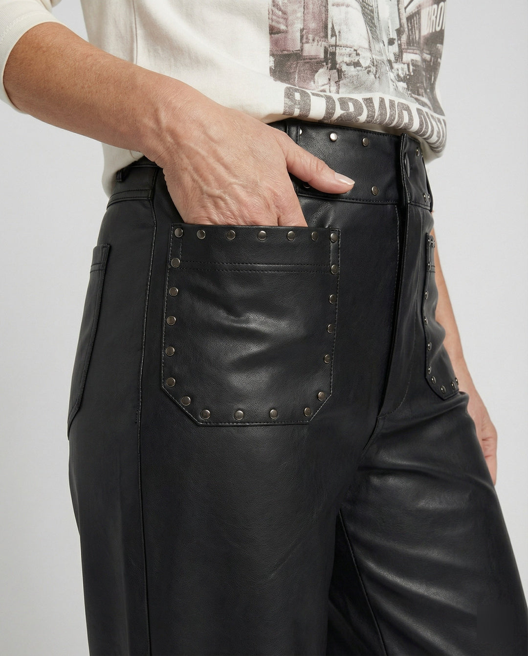 Ladies trendy faux leather pants with studs